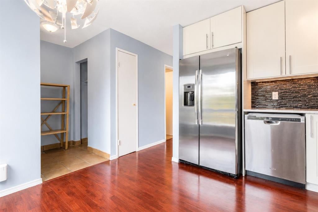160, 123 Queensland Drive SE, Calgary — photo 4 of 50
