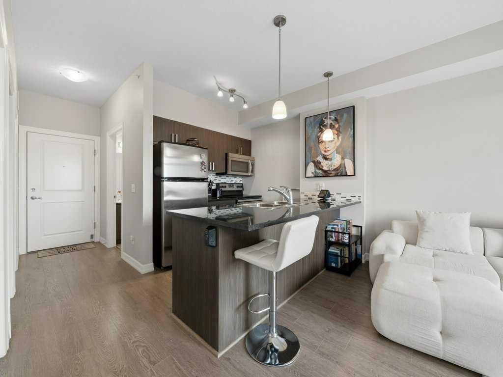 401, 117 Copperpond Common SE, Calgary — photo 4 of 27