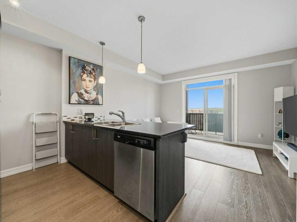 401, 117 Copperpond Common SE, Calgary — photo 5 of 27