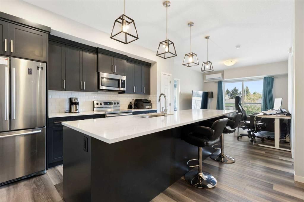 201, 300 Harvest Hills Place NE, Calgary — photo 5 of 30