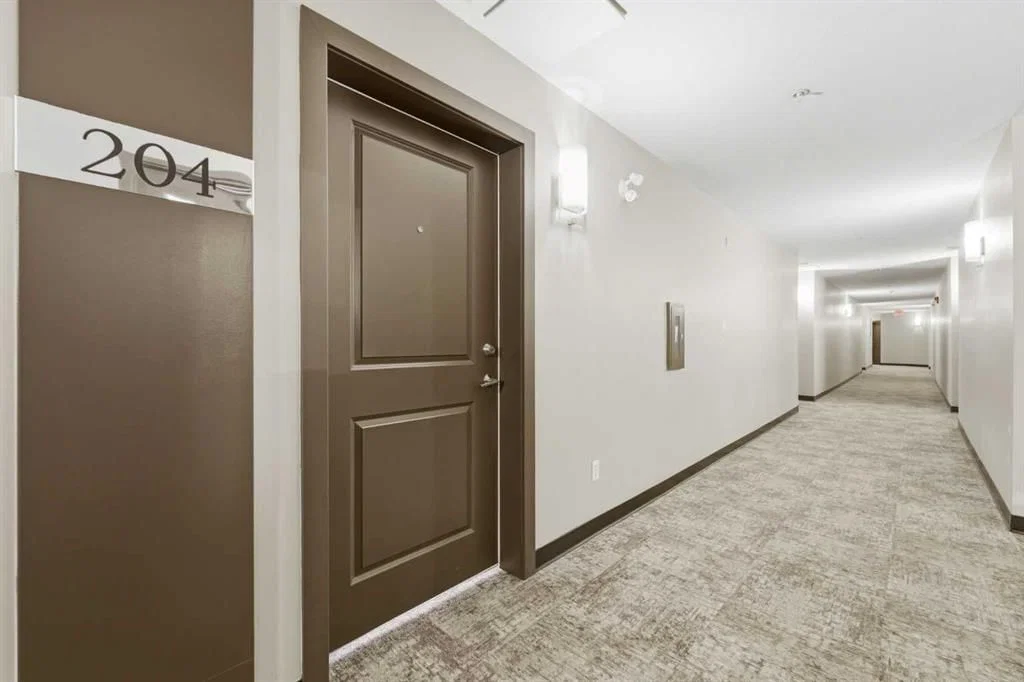 204, 23 Millrise Drive SW, Calgary — photo 4 of 42