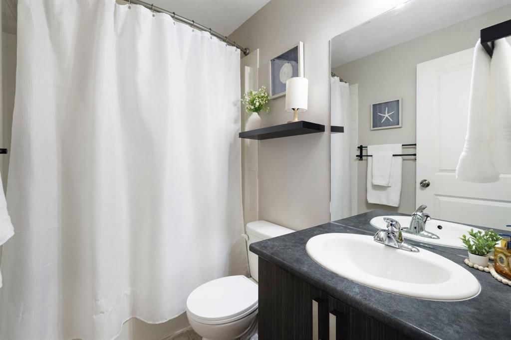 107, 117 Copperpond Common SE, Calgary — photo 5 of 37