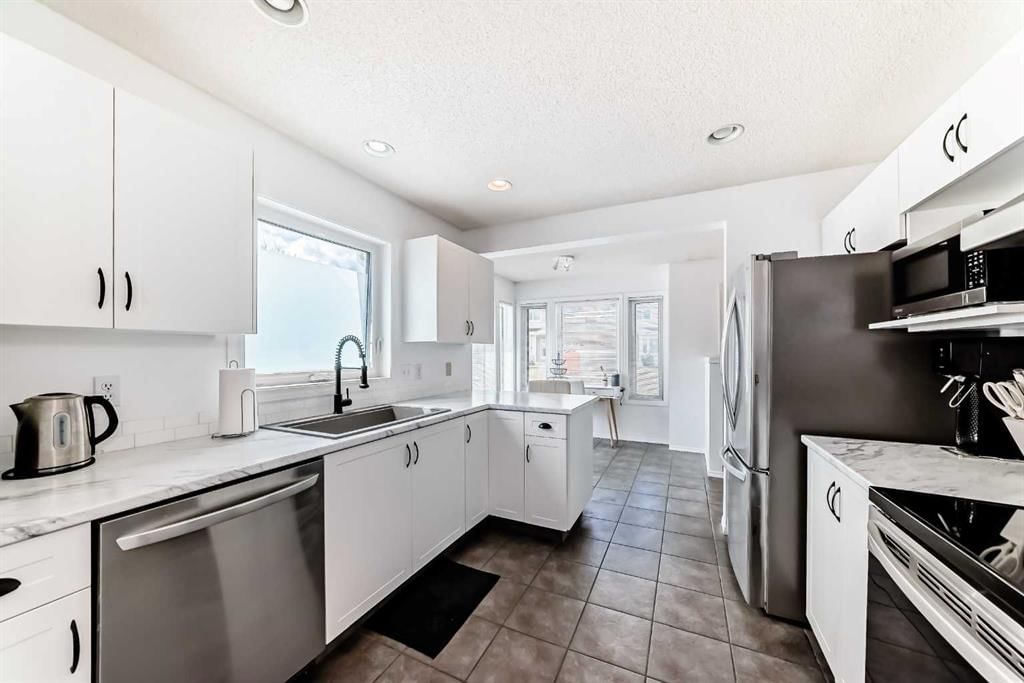 109, 388 Sandarac Drive NW, Calgary — photo 5 of 37