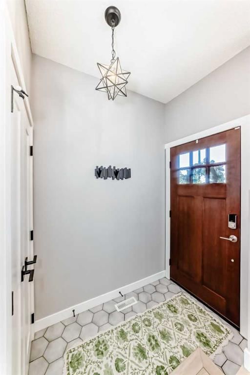 96 Coach Gate Way SW, Calgary — photo 3 of 46