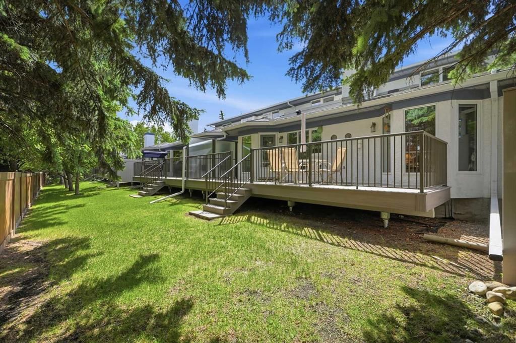 22A Woodmeadow Close SW, Calgary — main listing photo