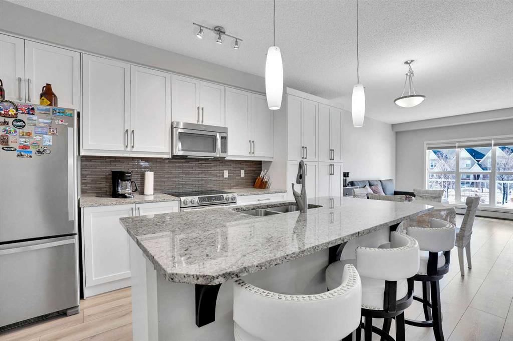 208, 402 Marquis Lane SE, Calgary — photo 4 of 36