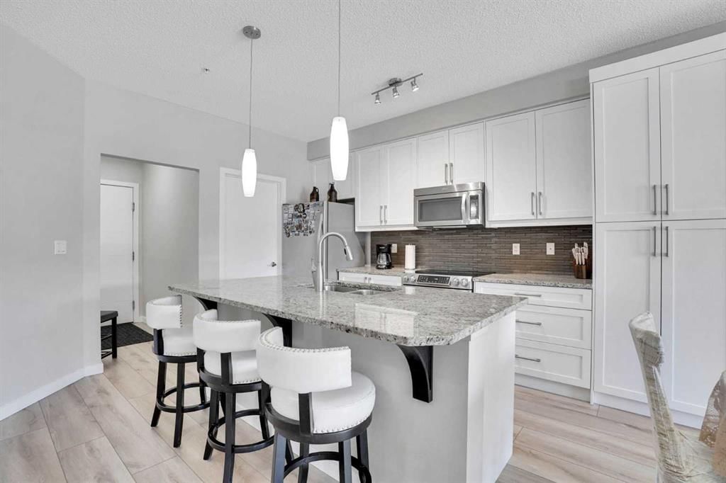 208, 402 Marquis Lane SE, Calgary — photo 5 of 36
