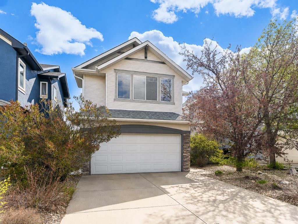 143 Cougarstone Square SW, Calgary — photo 4 of 36