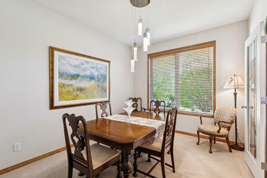 511 Rocky Ridge Drive NW, Calgary — photo 4 of 50
