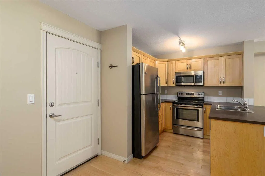 1113, 130 Panatella Street NW, Calgary — photo 4 of 27