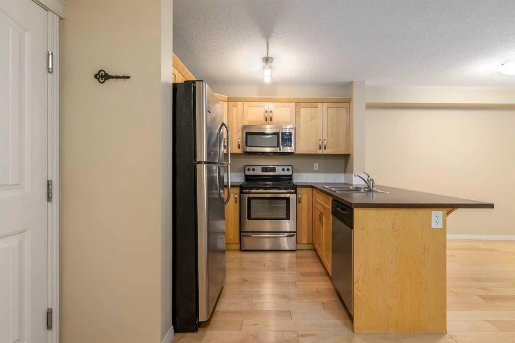 1113, 130 Panatella Street NW, Calgary — photo 5 of 27