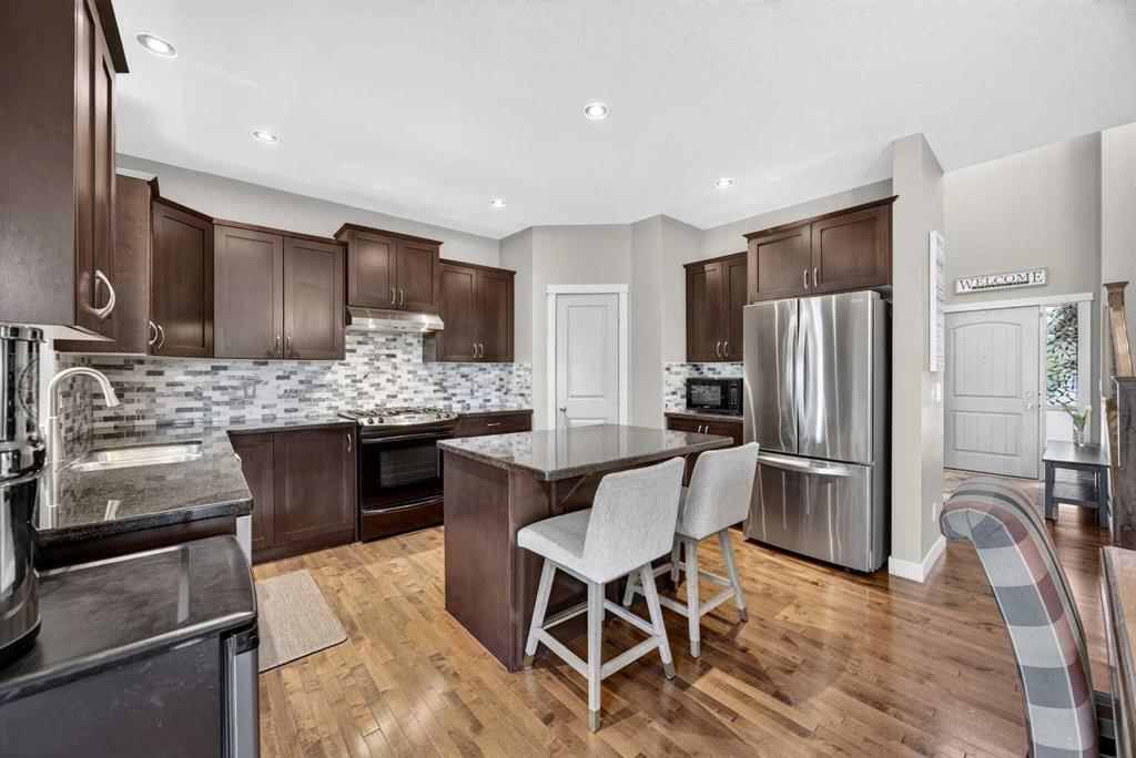 2029 Luxstone Boulevard SW, Airdrie — photo 2 of 50