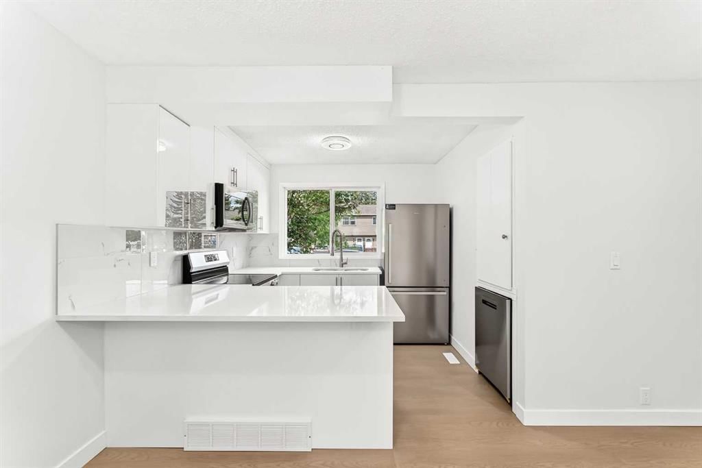 12, 7205 4 Street NE, Calgary — photo 3 of 43
