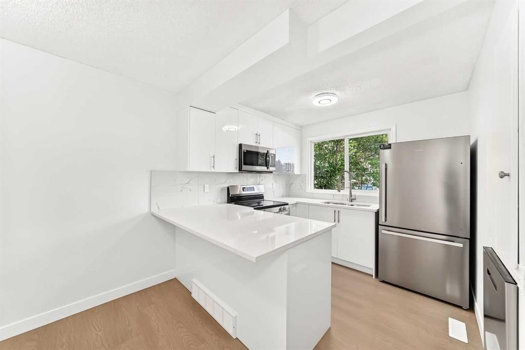 12, 7205 4 Street NE, Calgary — photo 4 of 43