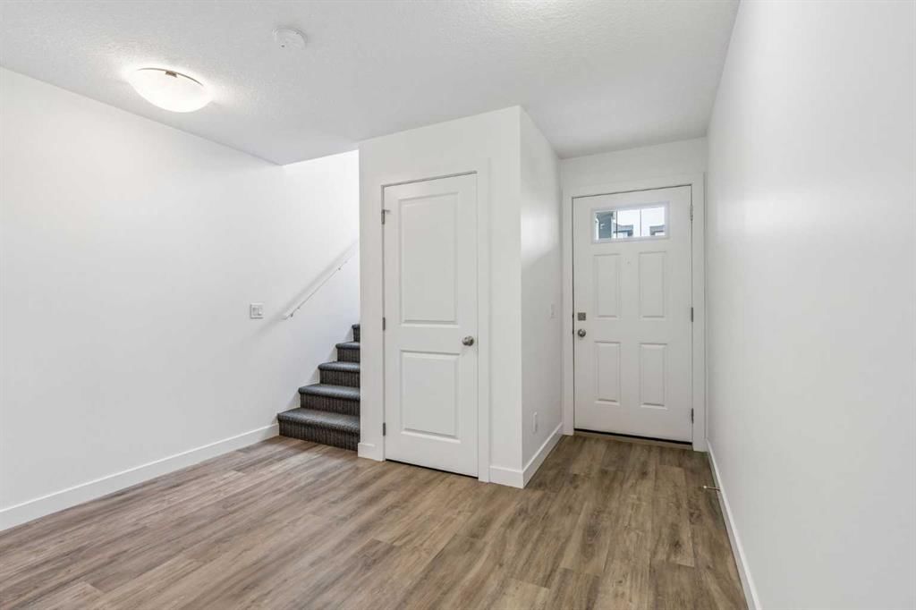 1002, 24 Rivercrest Drive, Cochrane — photo 3 of 32