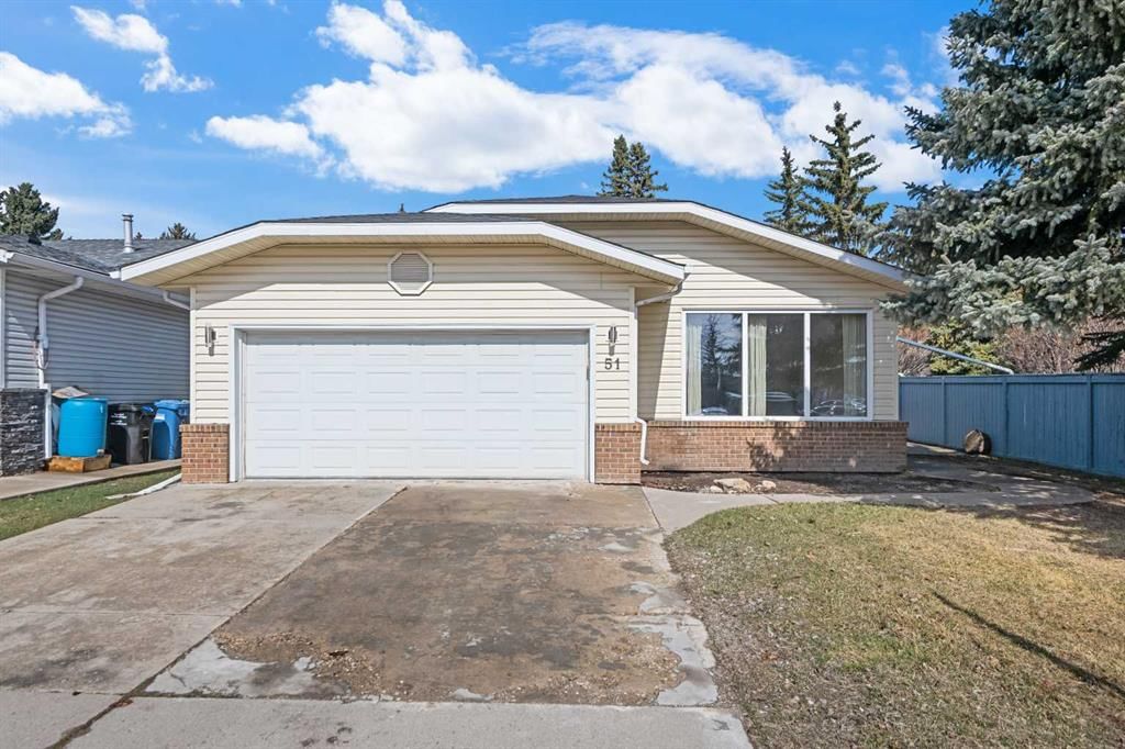 51 Woodmont Road SW, Calgary — main listing photo