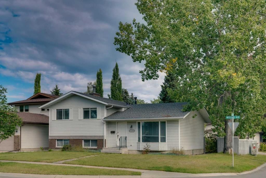 703 Woodpark Boulevard SW, Calgary — main listing photo