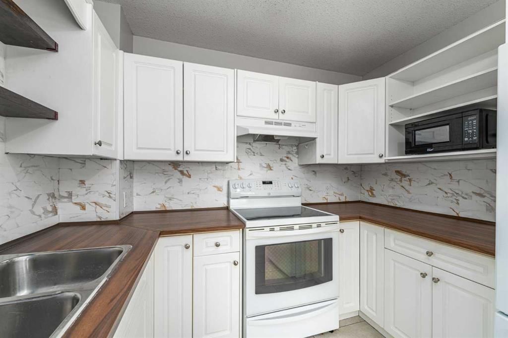 1, 12 Silver Creek Boulevard NW, Airdrie — photo 3 of 46