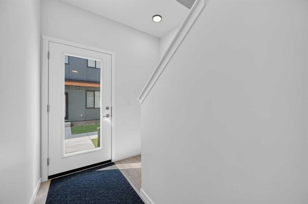 405, 81 MIDTOWN Boulevard SW, Airdrie — photo 3 of 44