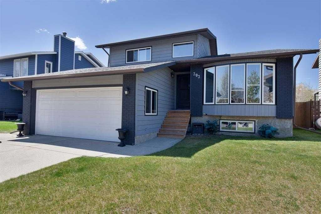 303 Woodside Place, Okotoks — photo 4 of 49