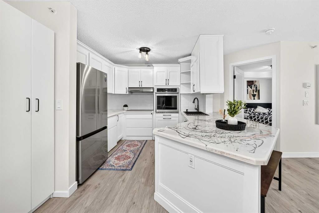 411, 4000 Somervale Court SW, Calgary — main listing photo