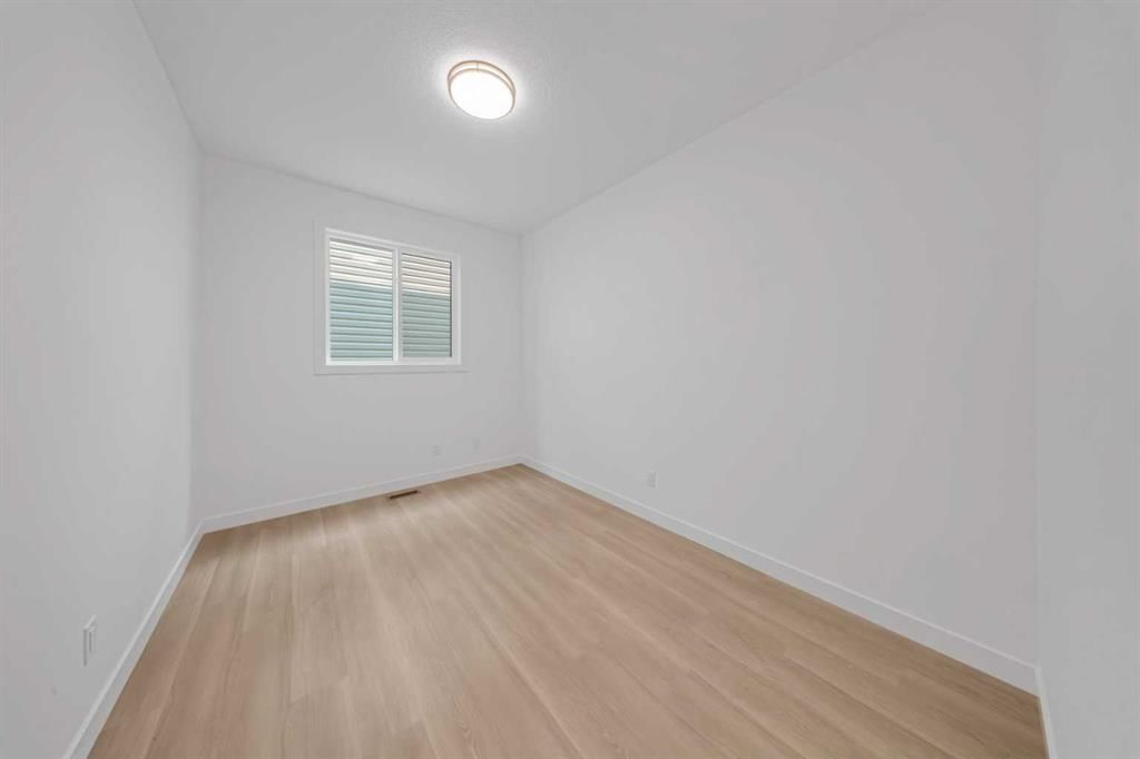 1412 South Point Villas SW, Airdrie — photo 5 of 37