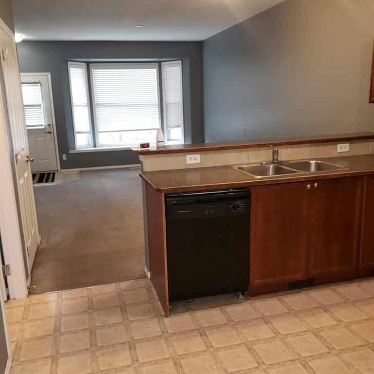604, 2066 Luxstone Boulevard SW, Airdrie — photo 4 of 12