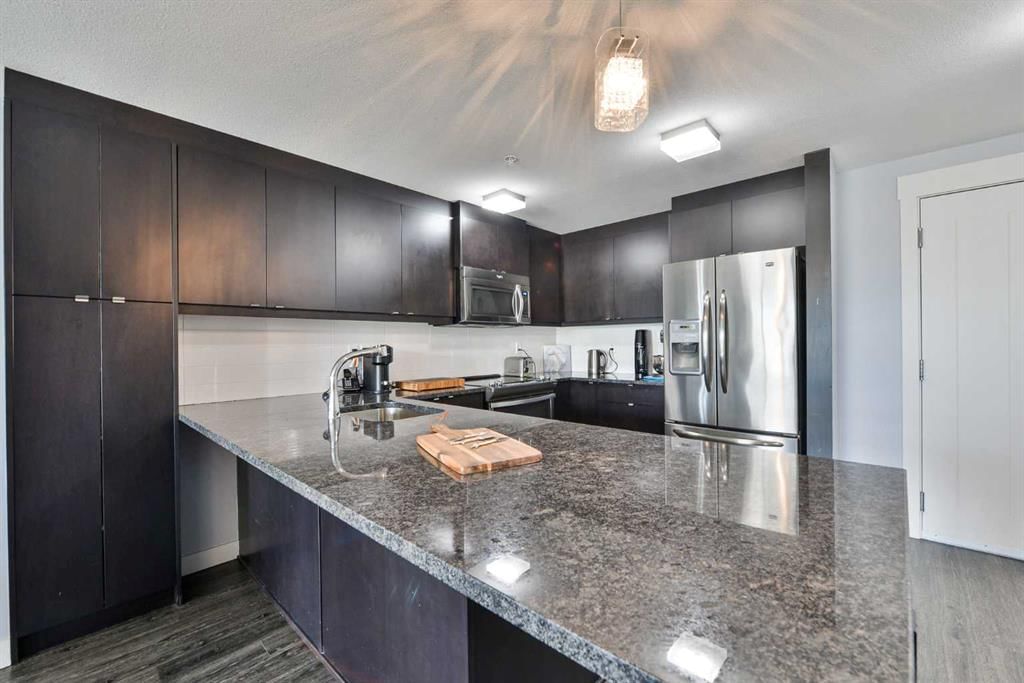 213, 45 Aspenmont Heights SW, Calgary — photo 5 of 44