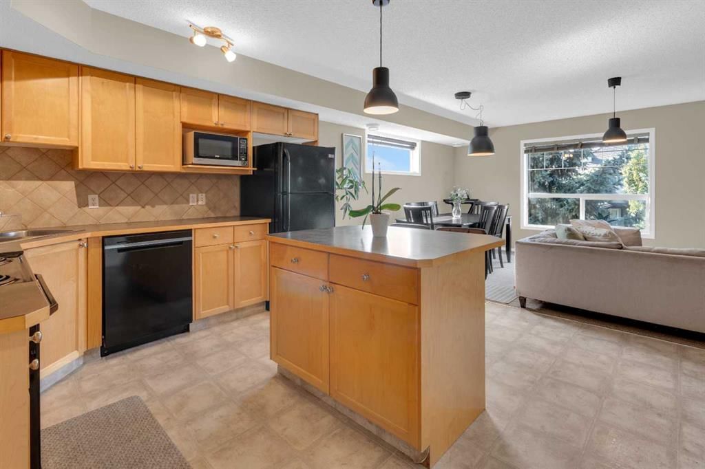 411, 140 Sagewood Boulevard SW, Calgary — row/townhouse for sale