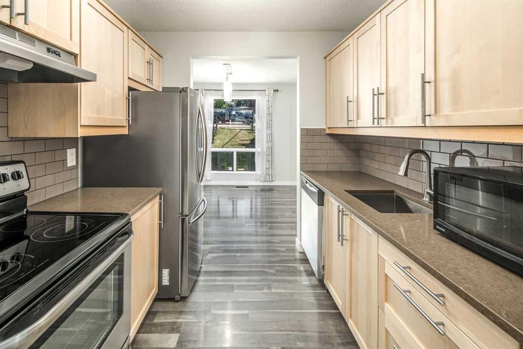 16, 6915 Ranchview Drive NW, Calgary — photo 3 of 34