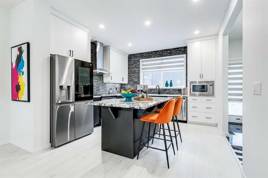 184 Rowmont Boulevard NW, Calgary — photo 3 of 38