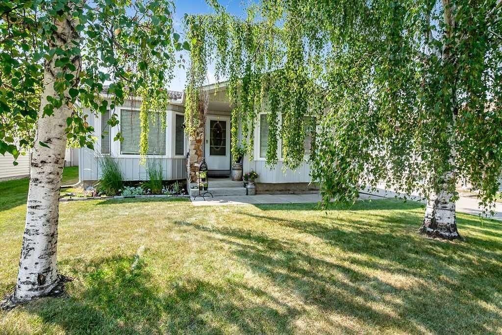 163 Woodburn Crescent, Okotoks — photo 4 of 45