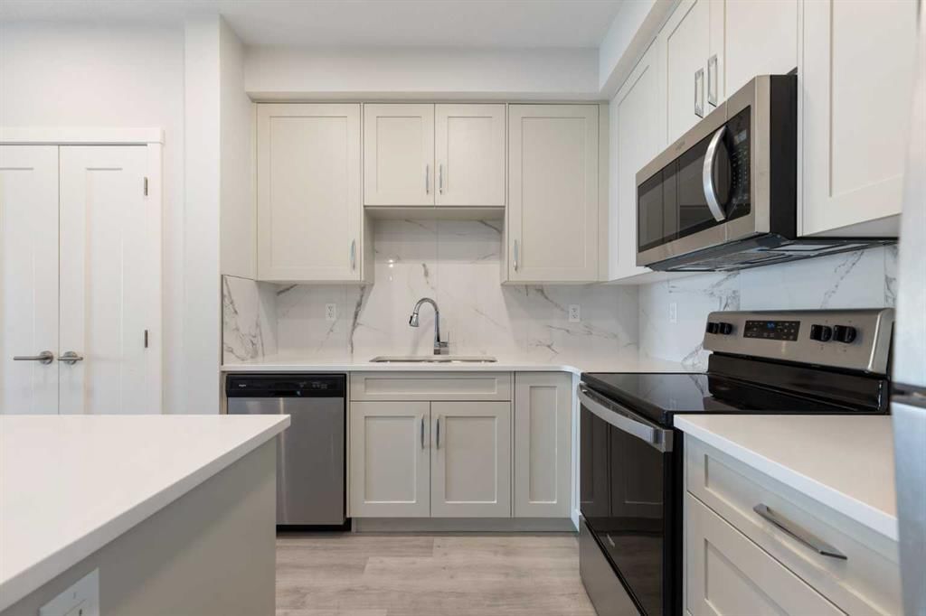 202, 150 Shawnee Square SW, Calgary — photo 4 of 36