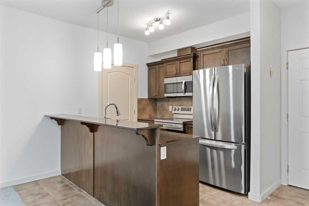 208, 141 Mountain Street, Cochrane — photo 3 of 21