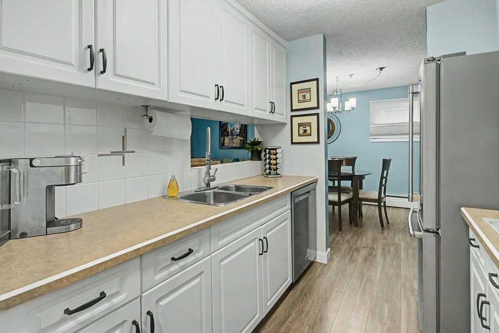102, 723 57 Avenue SW, Calgary — photo 5 of 38