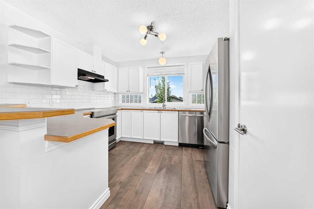 708 Tuscany Drive NW, Calgary — photo 3 of 38