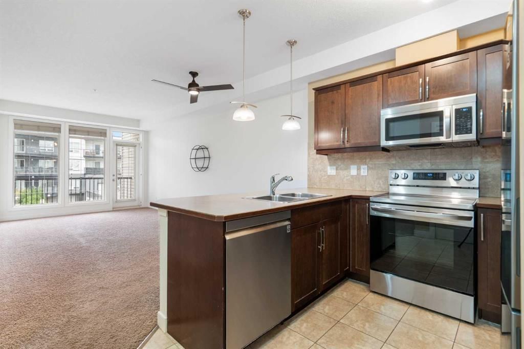 210, 15304 Bannister Road SE, Calgary — photo 4 of 35