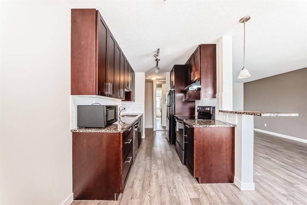 302, 4455A Greenview Drive NE, Calgary — photo 5 of 39