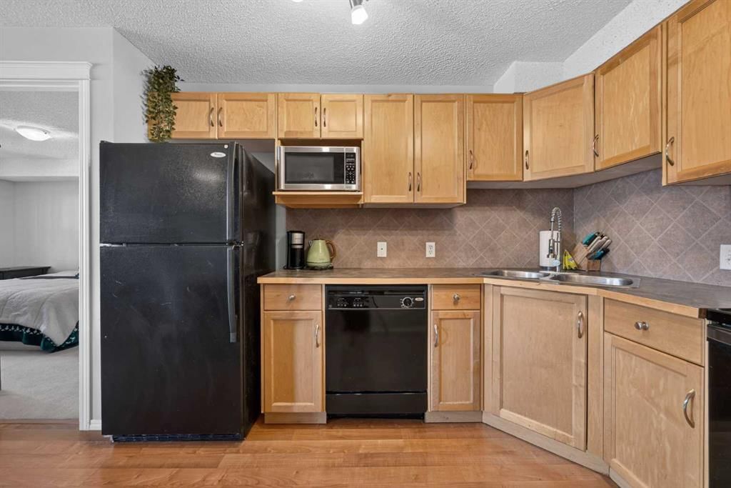 2207, 140 Sagewood Boulevard SW, Airdrie — photo 4 of 23