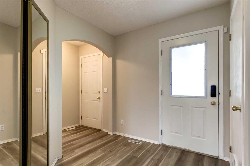 1820 Woodside Boulevard NW, Airdrie — photo 3 of 45