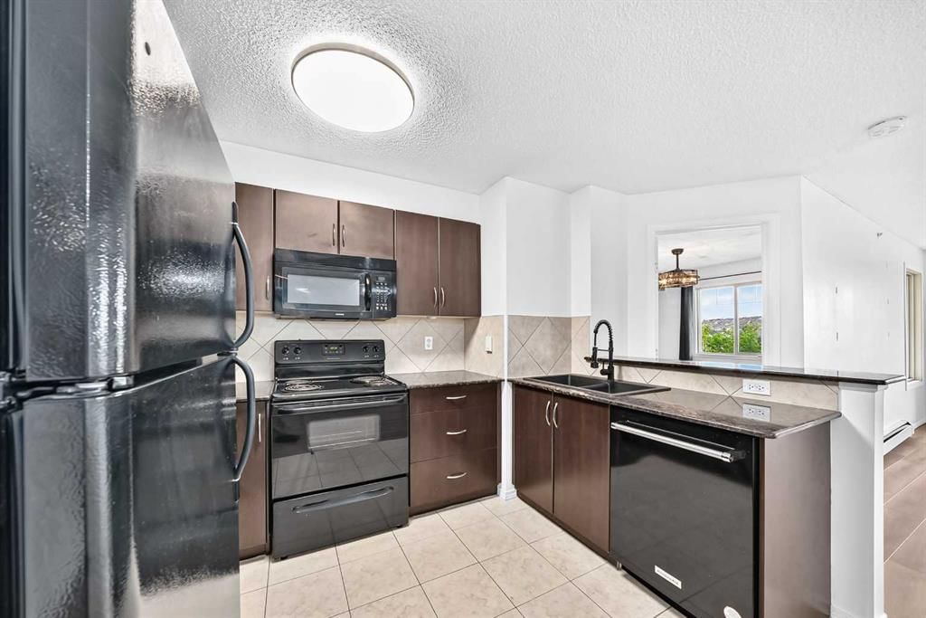 2410, 60 Panatella Street NW, Calgary — photo 3 of 26