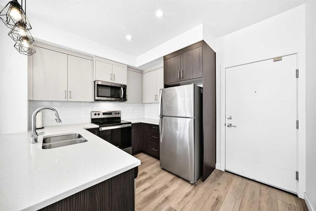 301, 205 Spring Creek Common SW, Calgary — photo 4 of 22
