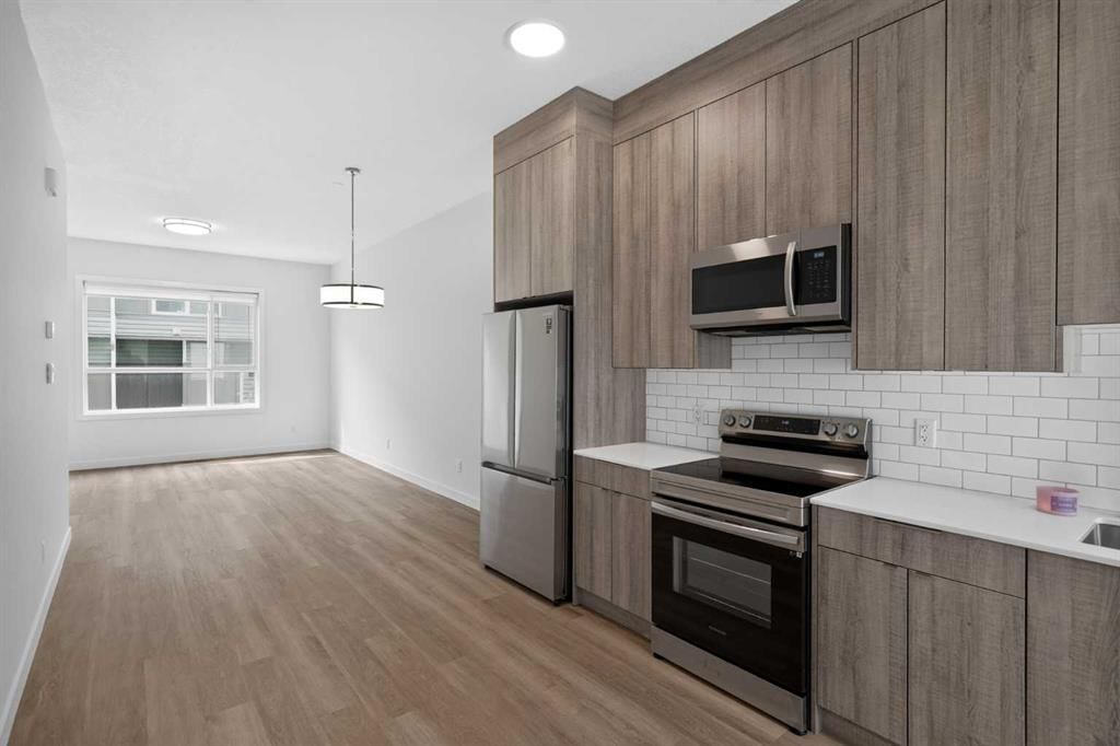 202, 101 Panatella Square NW, Calgary — photo 2 of 32