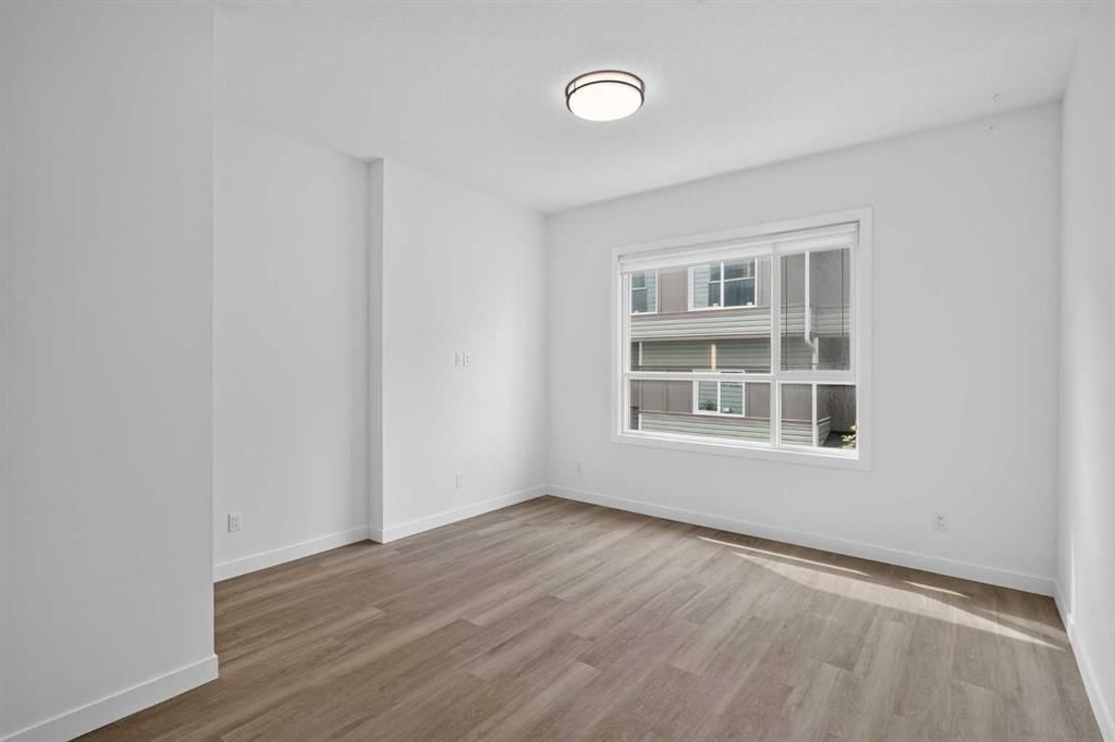 202, 101 Panatella Square NW, Calgary — photo 5 of 32