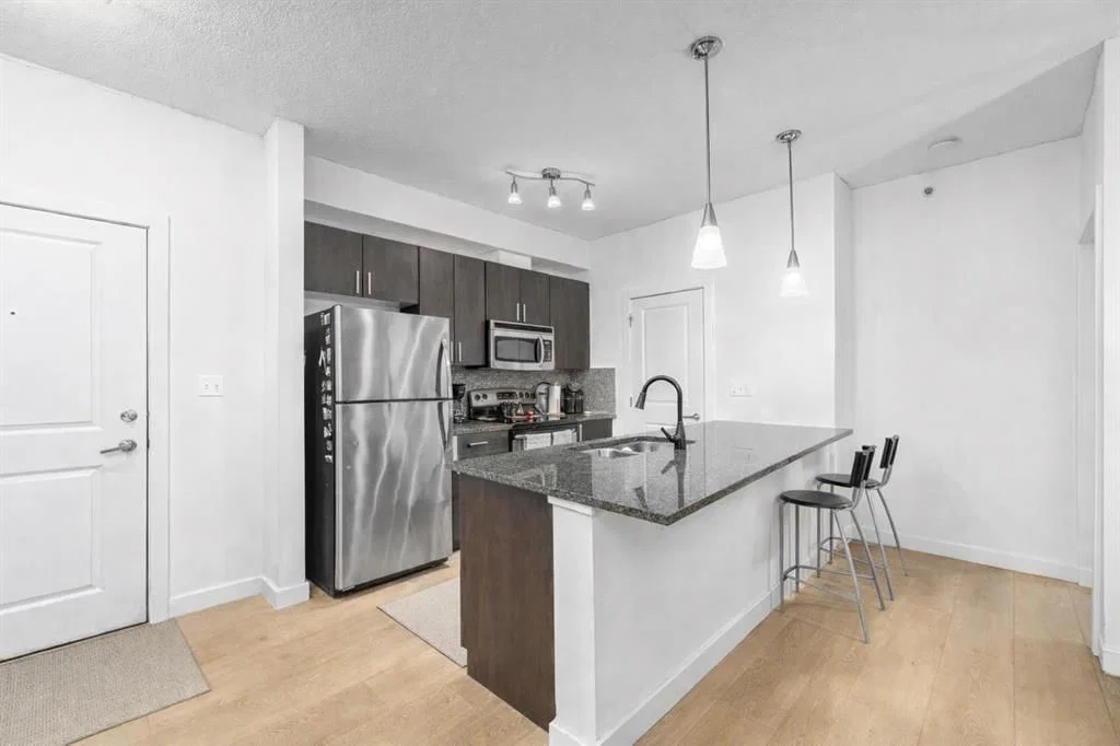 427, 11 Millrise Drive SW, Calgary — photo 4 of 31