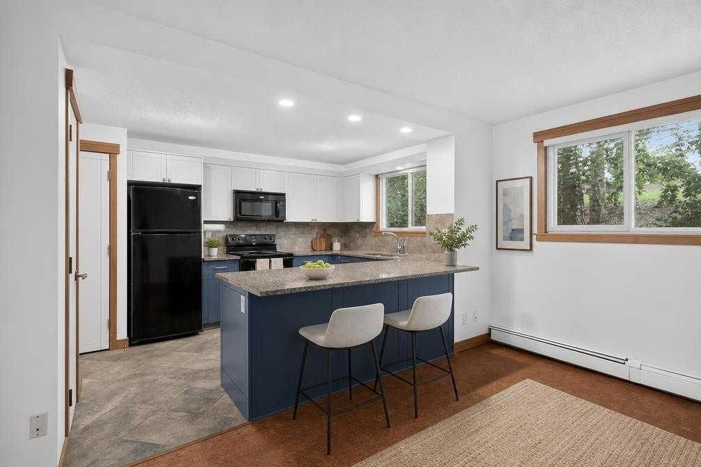 112, 315 50 Avenue SW, Calgary — photo 3 of 38