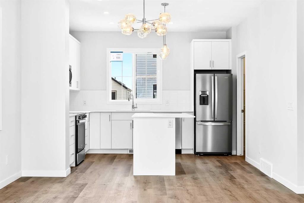 204, 40 Creekside Way SW, Calgary — main listing photo