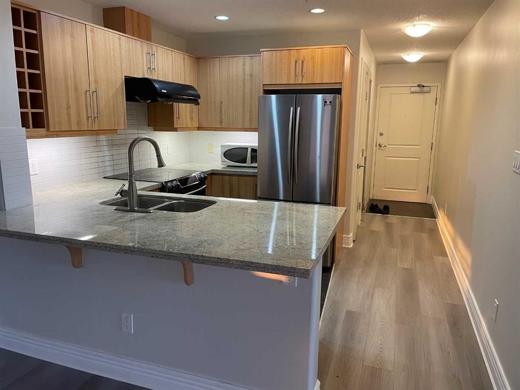 1406, 55 Spruce Place SW, Calgary — main listing photo