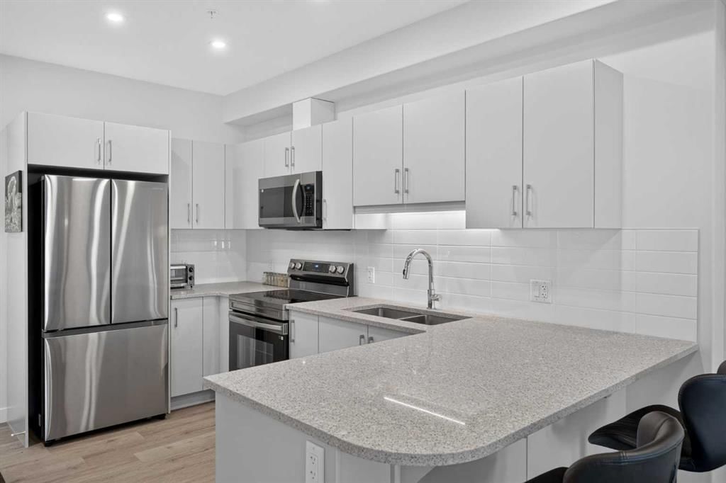 1209, 81 Arbour Lake View NW, Calgary — photo 4 of 42