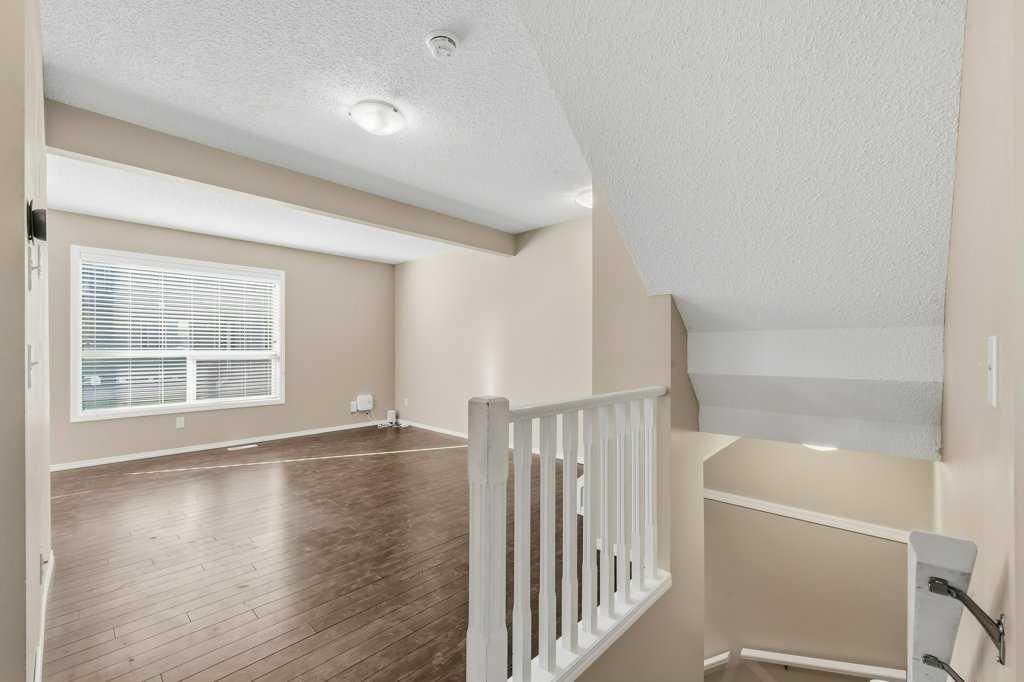 304, 140 Sagewood Boulevard SW, Airdrie — photo 4 of 33